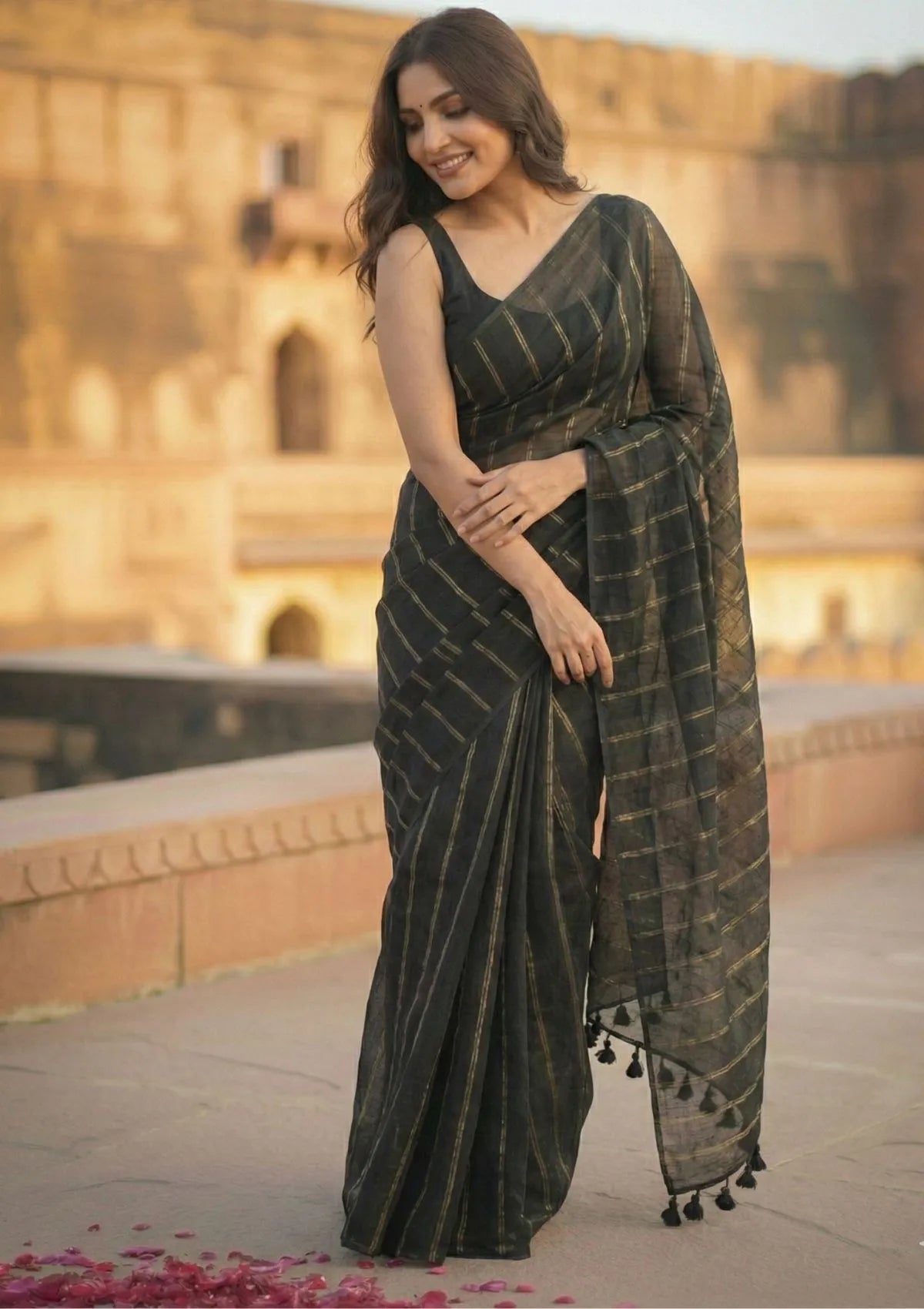 Saanjh Black Soft Mulmul Cotton Saree with Gold Zari Stripes and Tassels