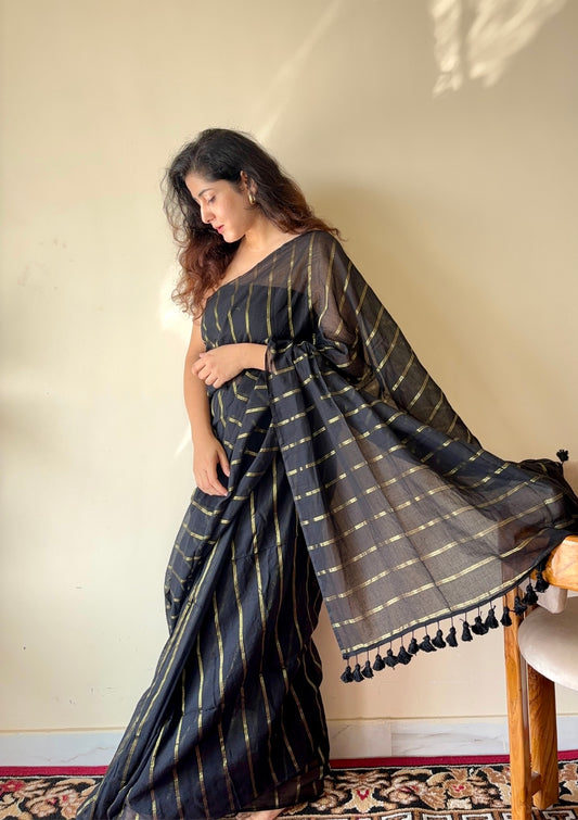 Saanjh Black Soft Mulmul Cotton Saree with Gold Zari Stripes and Tassels - Qatha 