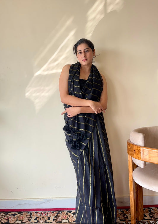 Saanjh Black Soft Mulmul Cotton Saree with Gold Zari Stripes and Tassels - Qatha 