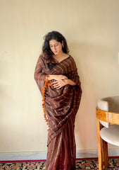 Vedika  Chocolate Brown Mulmul Cotton Saree with Gold Zari Stripes and Tassels - Qatha 