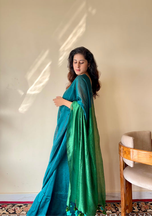 Mrinalini Peacock Blue and Green Soft Cotton Mulmul Saree with Tassels - Qatha 