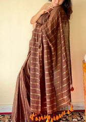 Vedika  Chocolate Brown Mulmul Cotton Saree with Gold Zari Stripes and Tassels - Qatha 