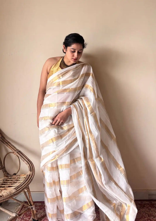 Gauri |  Ivory White Gold Handloom Cotton Saree with Zari Stripes