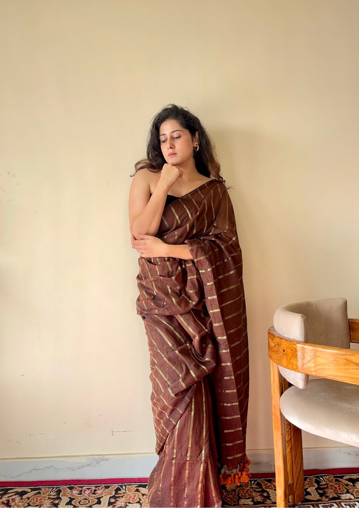 Vedika  Chocolate Brown Mulmul Cotton Saree with Gold Zari Stripes and Tassels - Qatha 