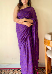 Indrani Deep Purple Cotton Mulmul Saree with Gold Stripes and Tassels - Qatha 