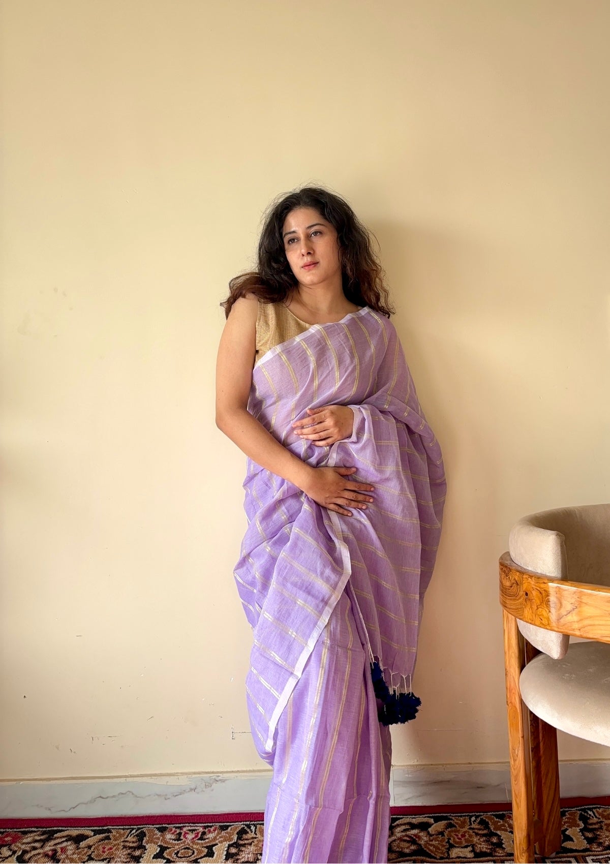Ira  Light Purple Soft Mulmul Cotton Saree with Gold Zari Stripes and Tassels - Qatha 