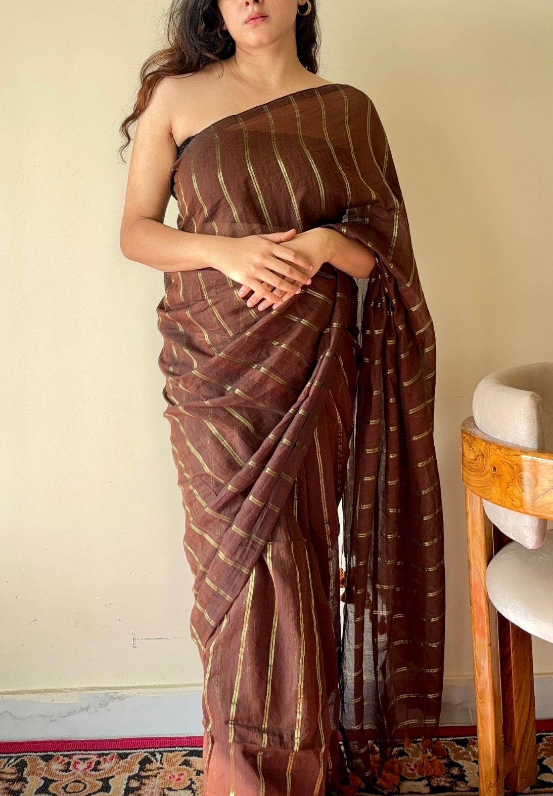 Vedika  Chocolate Brown Mulmul Cotton Saree with Gold Zari Stripes and Tassels - Qatha 