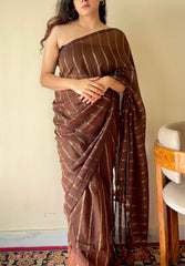 Vedika  Chocolate Brown Mulmul Cotton Saree with Gold Zari Stripes and Tassels - Qatha 
