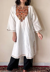 Naira | White Woollen Kashmiri Phiran with Floral Aari Embroidery